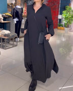 Women's black minimalist maxi dress with v-neck and collar