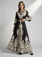 Women's blue printed a-line dress with tie belt and fitted bodice