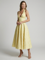 Women's white jacquard midi dress with halterneck and fitted bodice