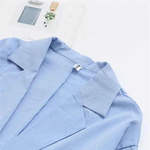 Women's blue linen jumpsuit with wide leg and relaxed fit