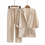 Women's blue linen jumpsuit with wide leg and relaxed fit