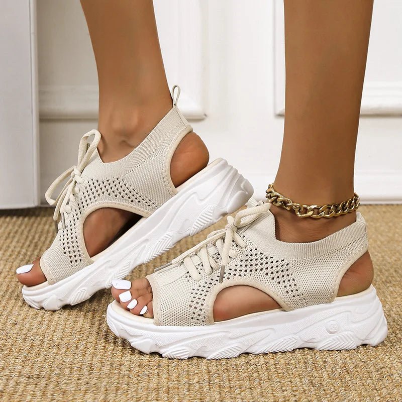 Women's black knit platform sandals with lace-up front and cushioned sole
