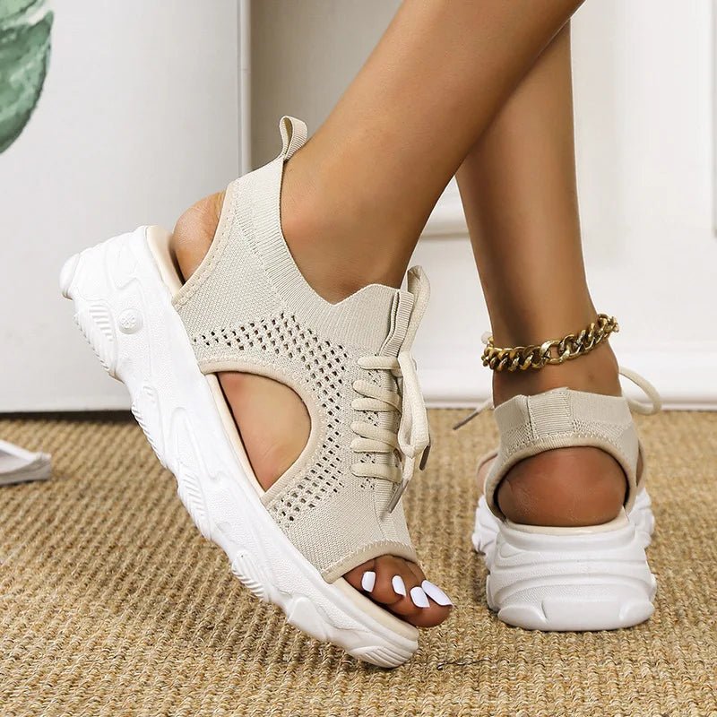 Women's black knit platform sandals with lace-up front and cushioned sole