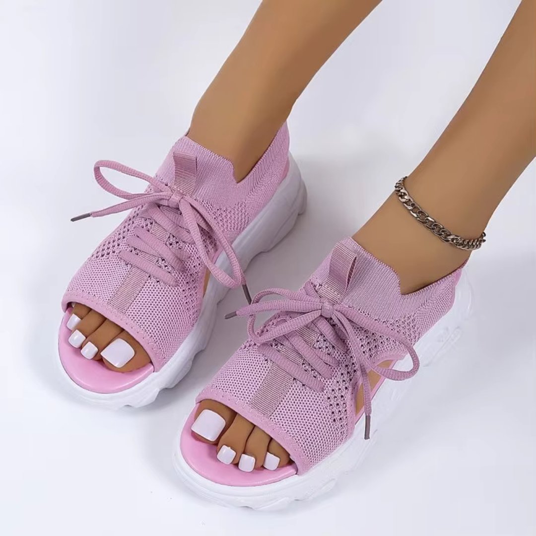Women's black knit platform sandals with lace-up front and cushioned sole
