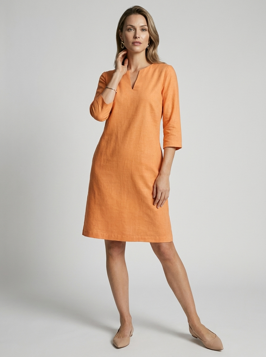 Women's pink minimalist midi dress with v-neck and three-quarter sleeves