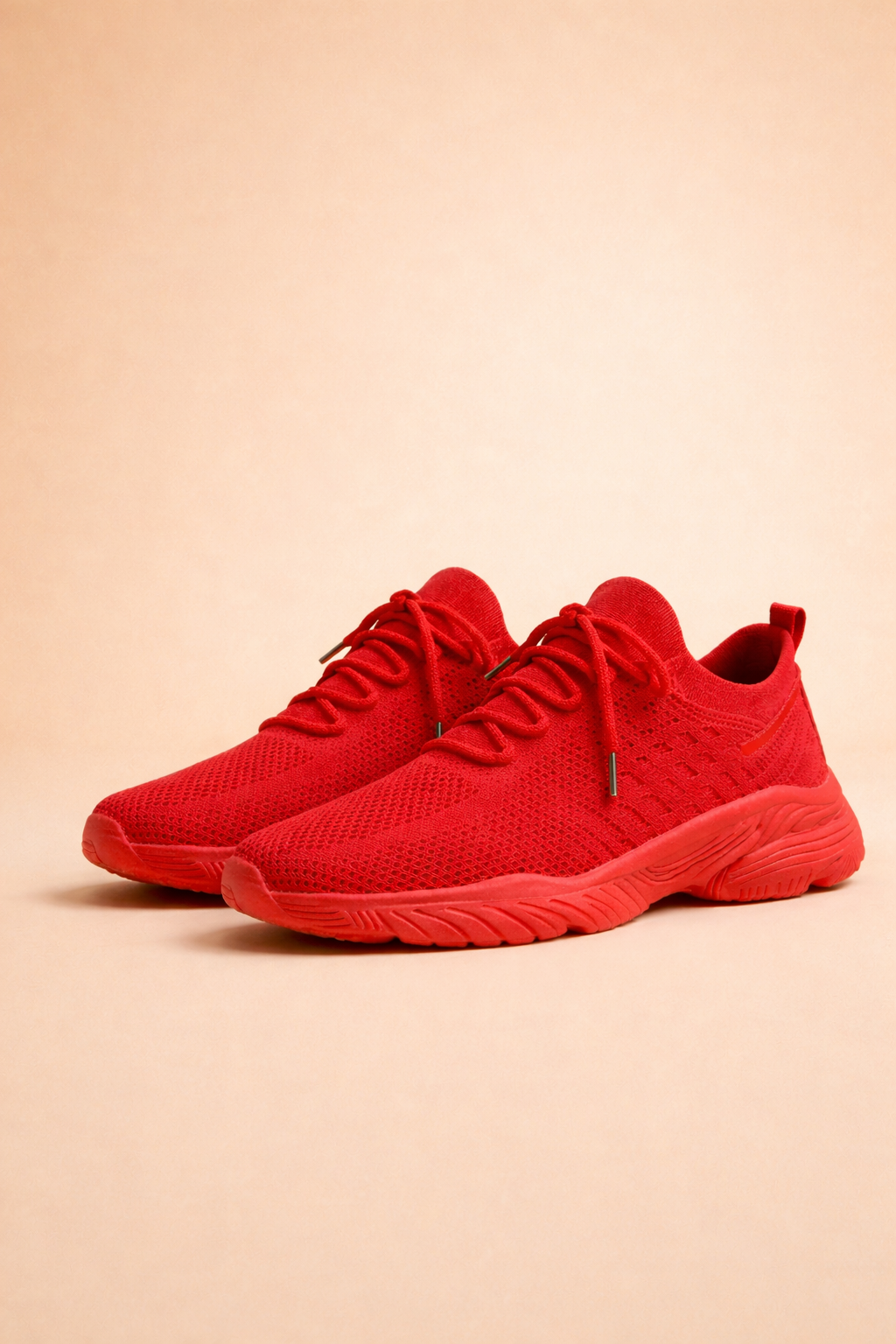 Women's red slip-on knit sneakers with cushioned sole