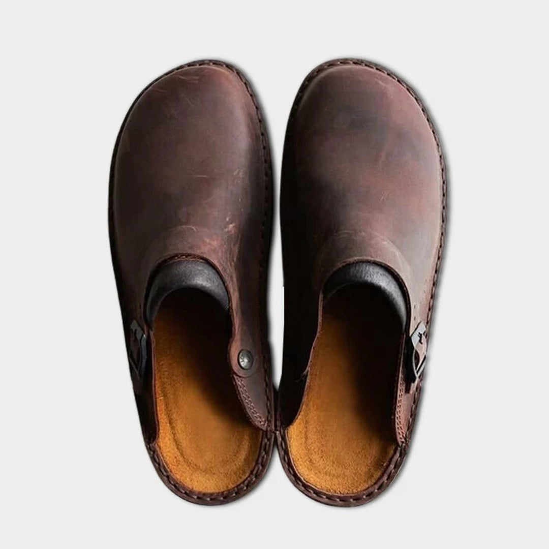 Men's brown faux leather moccasin slippers with non-slip sole