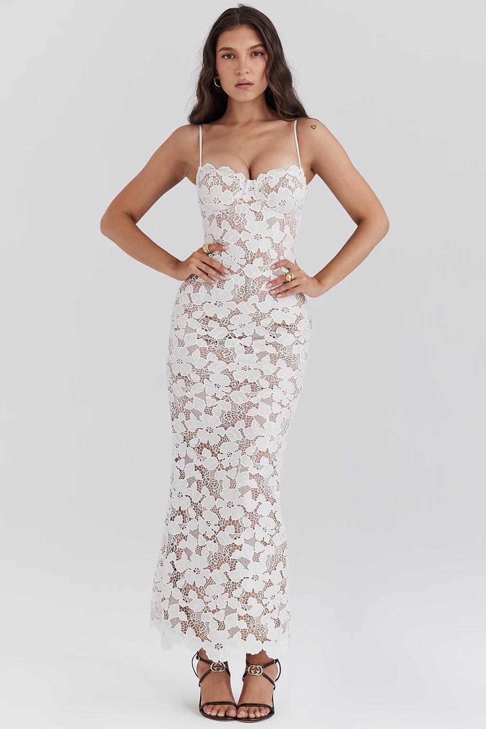 Women's white lace maxi dress with semi-sheer flowing skirt