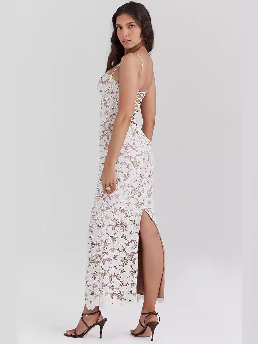 Women's white lace maxi dress with semi-sheer flowing skirt