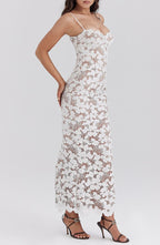 Women's white lace maxi dress with semi-sheer flowing skirt