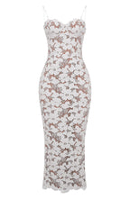 Women's white lace maxi dress with semi-sheer flowing skirt