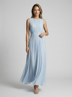 Women's light blue flowing sleeveless maxi dress with defined waist