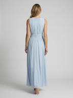 Women's light blue flowing sleeveless maxi dress with defined waist