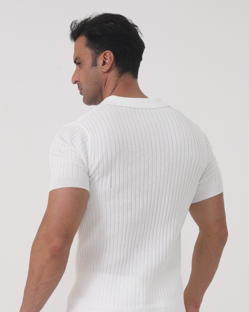 Men's white ribbed polo shirt with textured knit and classic collar