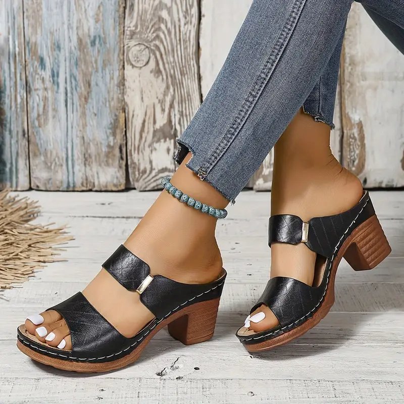 Women's black cushioned block heel sandals with woven straps