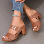 Women's black cushioned block heel sandals with woven straps