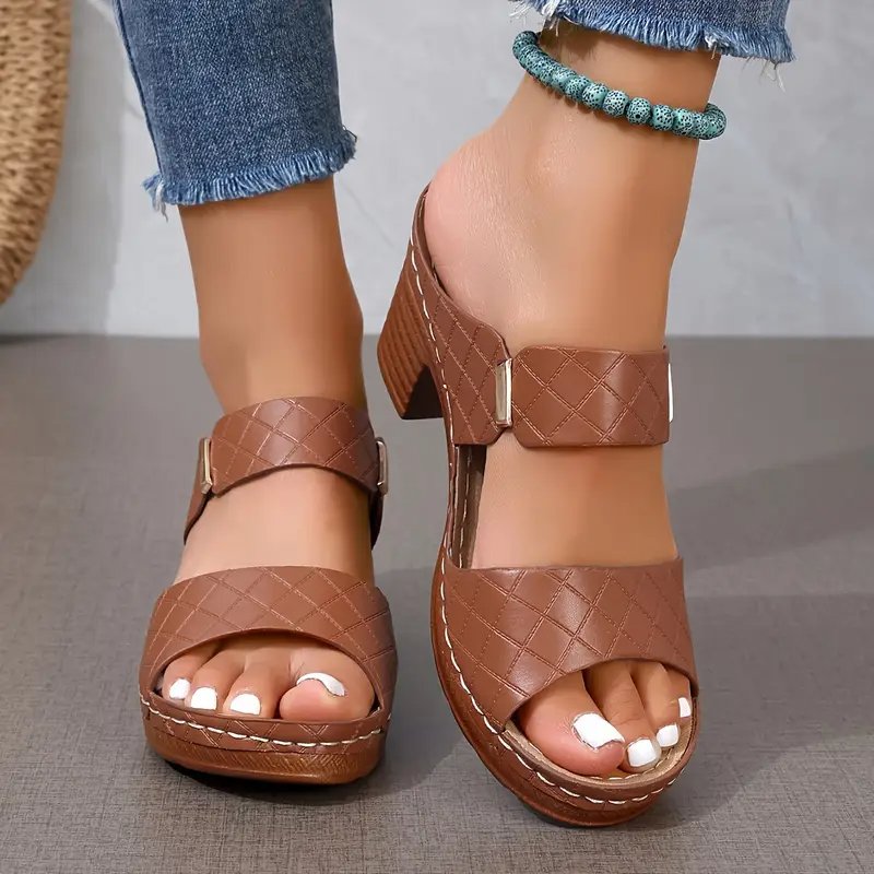 Women's black cushioned block heel sandals with woven straps