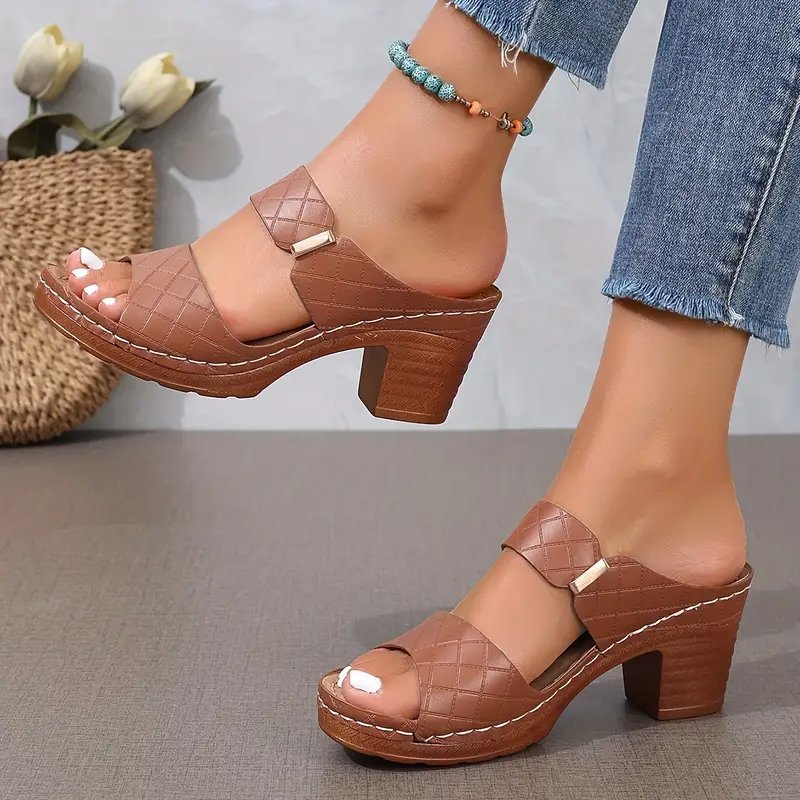 Women's black cushioned block heel sandals with woven straps