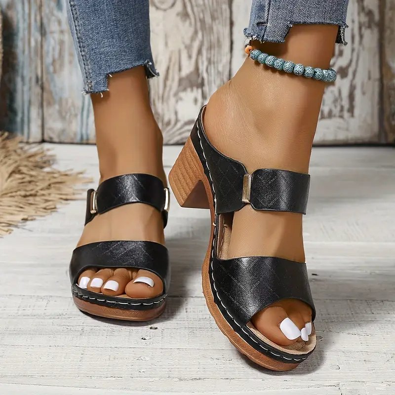 Women's black cushioned block heel sandals with woven straps