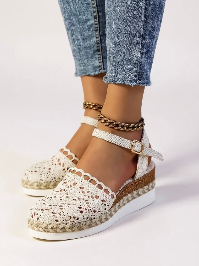 Women's beige espadrille wedge sandals with adjustable ankle strap