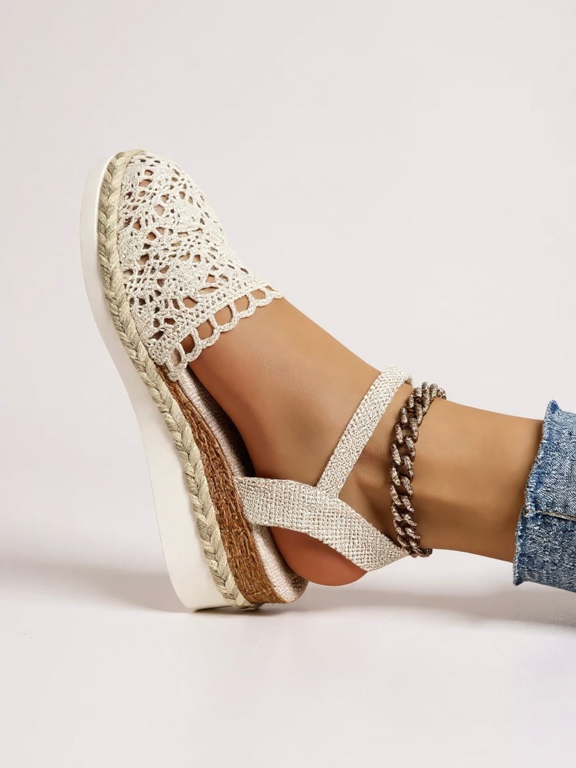 Women's beige espadrille wedge sandals with adjustable ankle strap