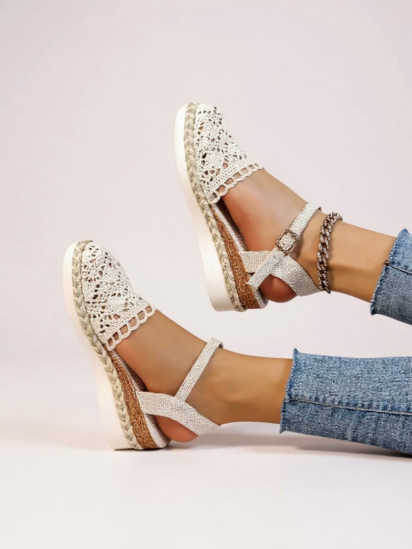 Women's beige espadrille wedge sandals with adjustable ankle strap