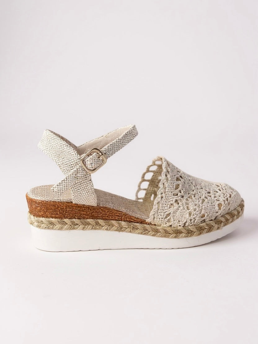 Women's beige espadrille wedge sandals with adjustable ankle strap