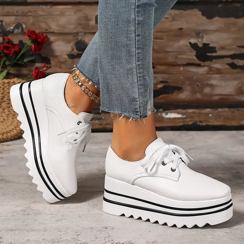 Women's beige lace-up platform oxford shoes on striped wedge sole