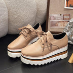 Women's beige lace-up platform oxford shoes on striped wedge sole