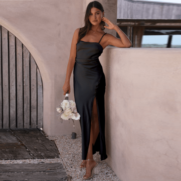 Women's black satin evening slip dress with draped bodice