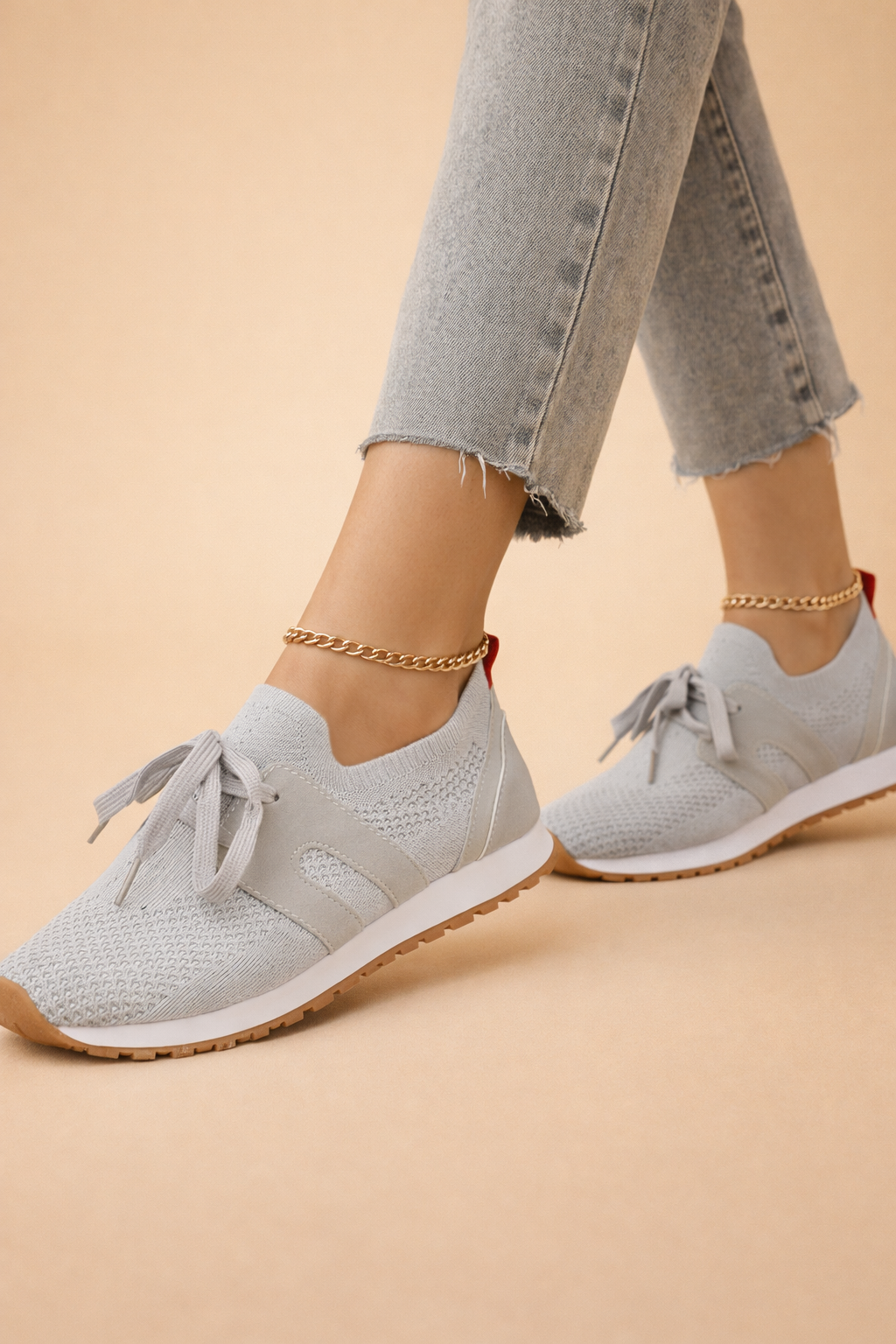 Women's grey lightweight knit trainers with low-top silhouette