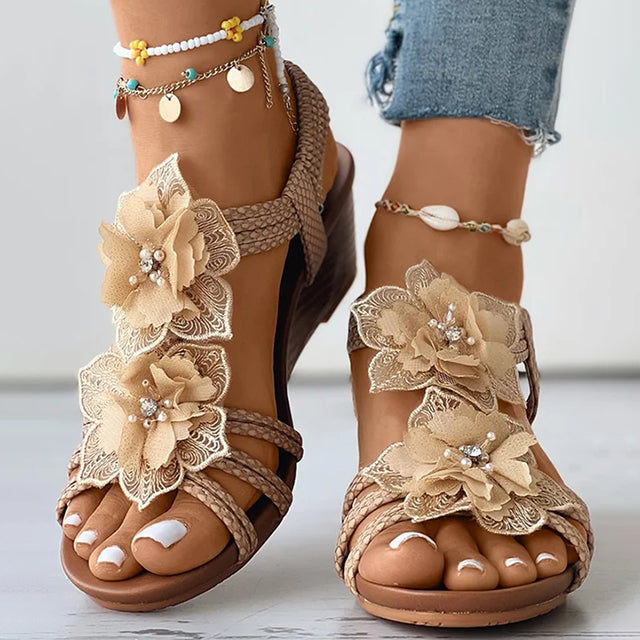 Women's black floral wedge sandals with mid heel and open toe