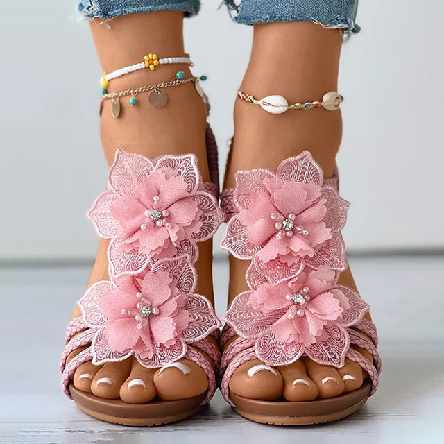 Women's pink floral wedge sandals with mid heel and open toe