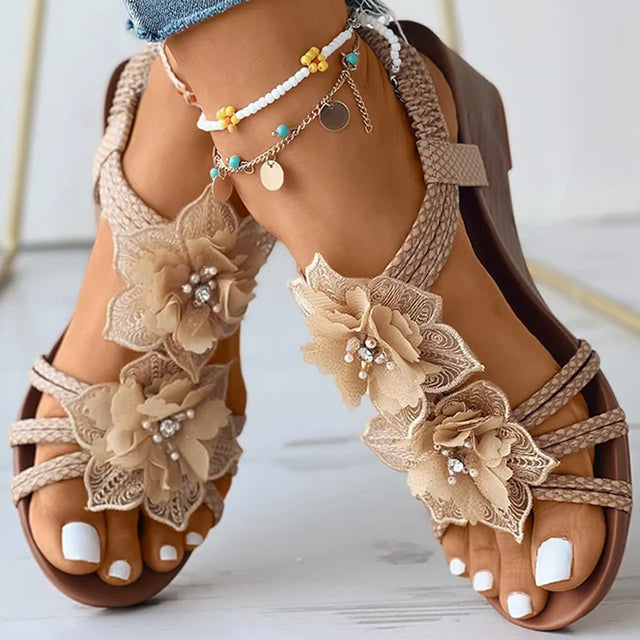 Women's black floral wedge sandals with mid heel and open toe