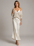 Women's white satin maxi dress with matching knit jumper set