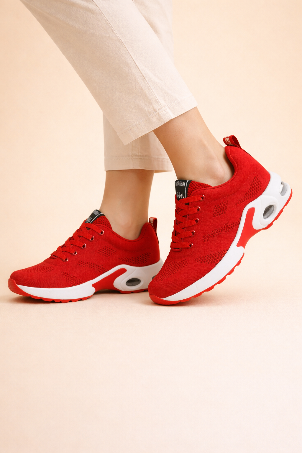 Women's black lightweight sports trainers with breathable knit upper