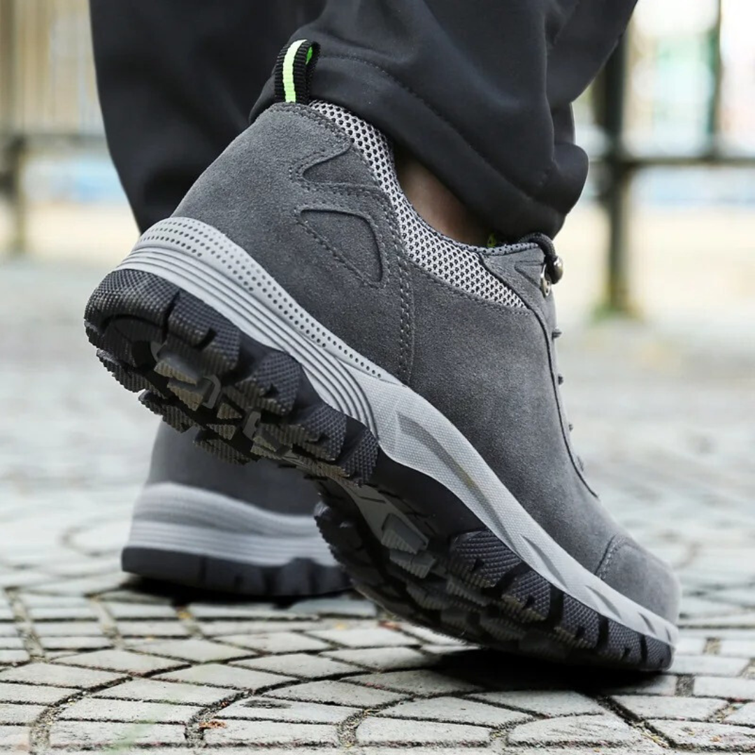 Men's grey waterproof hiking shoes with deep tread grip outsole