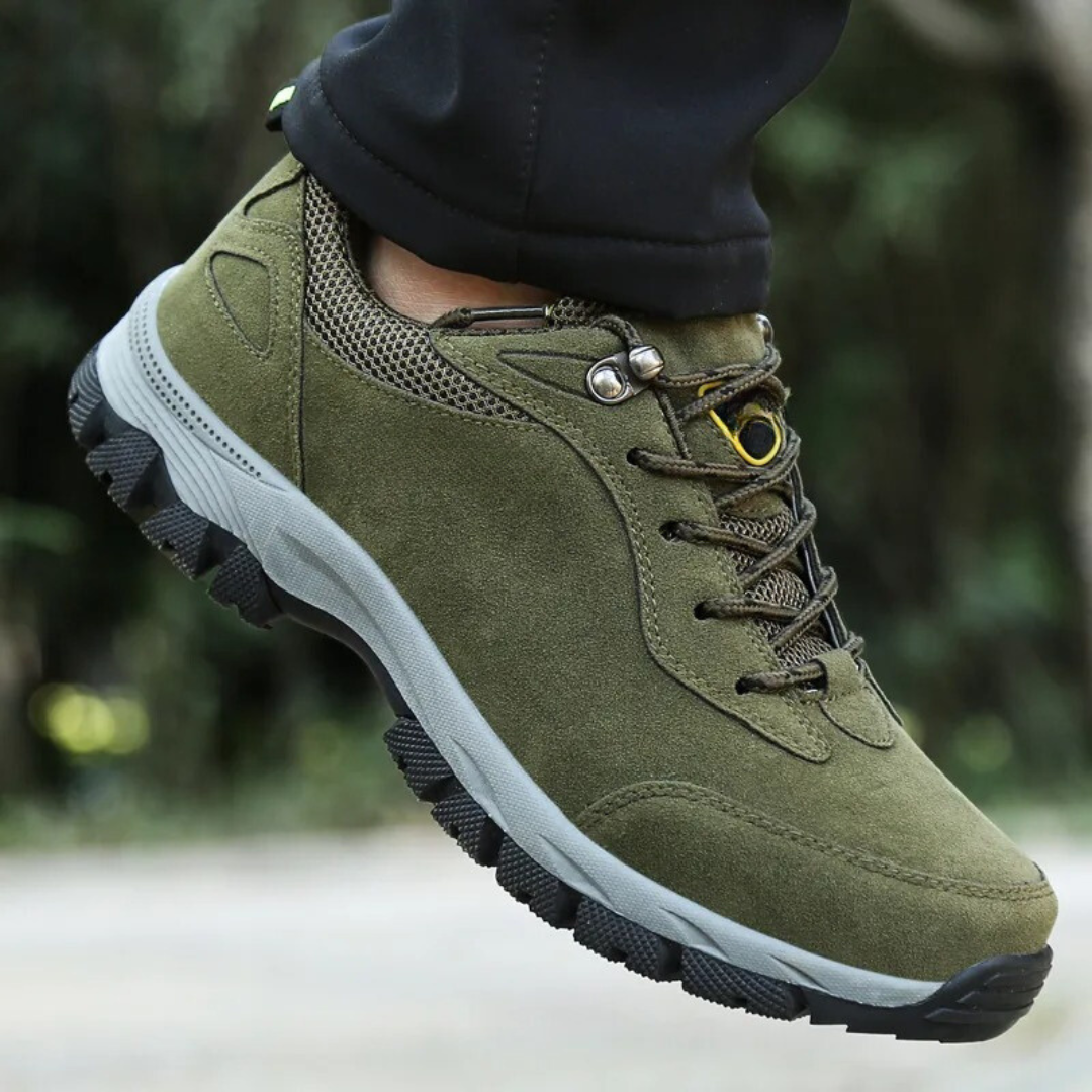 Men's grey waterproof hiking shoes with deep tread grip outsole