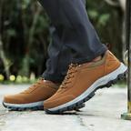 Men's grey waterproof hiking shoes with deep tread grip outsole