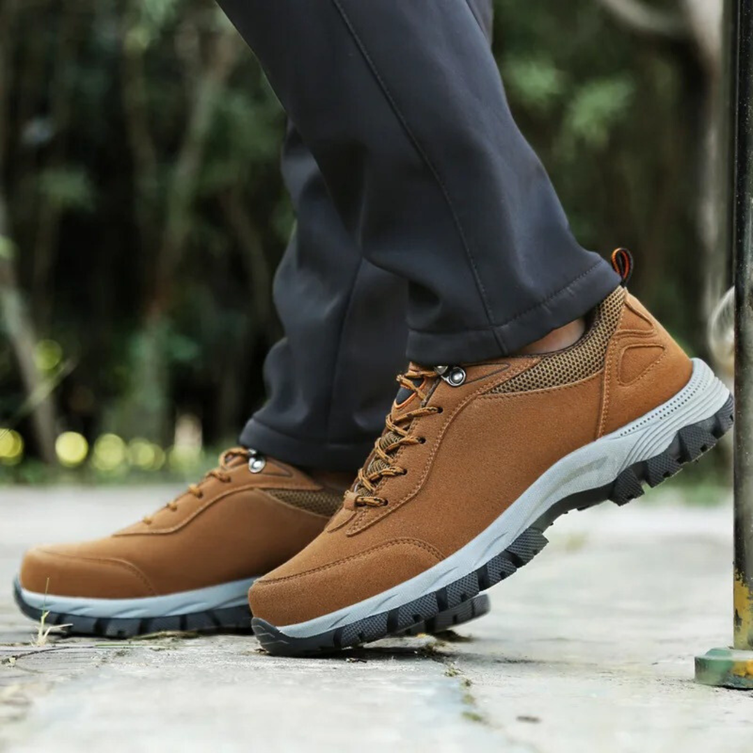Men's grey waterproof hiking shoes with deep tread grip outsole
