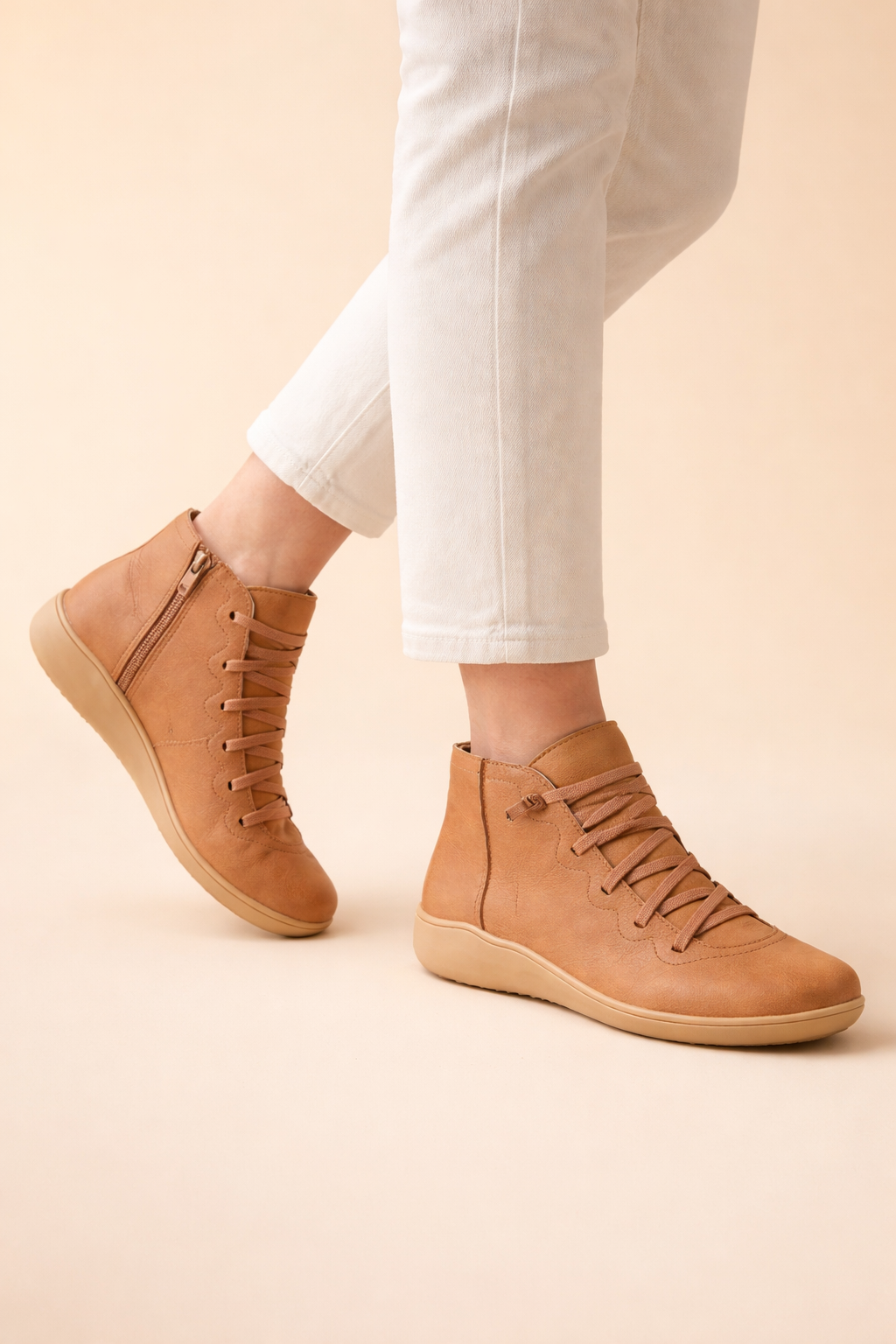 Women's brown ankle boots with low block heel and round toe