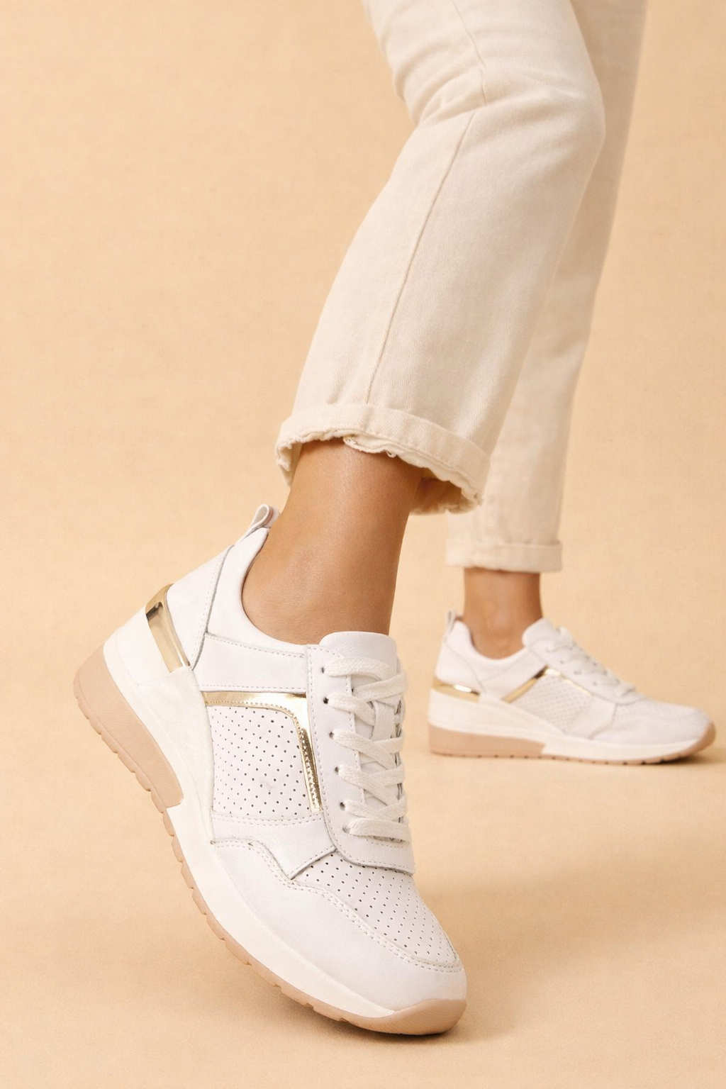 Women's white hidden wedge sneakers with perforated lace-up upper