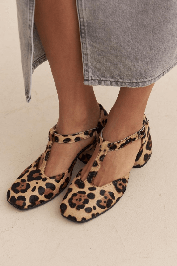 Women's light brown t-strap comfort shoes with animal print and buckle