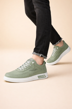 Men's green low-top street sneakers with lace-up front