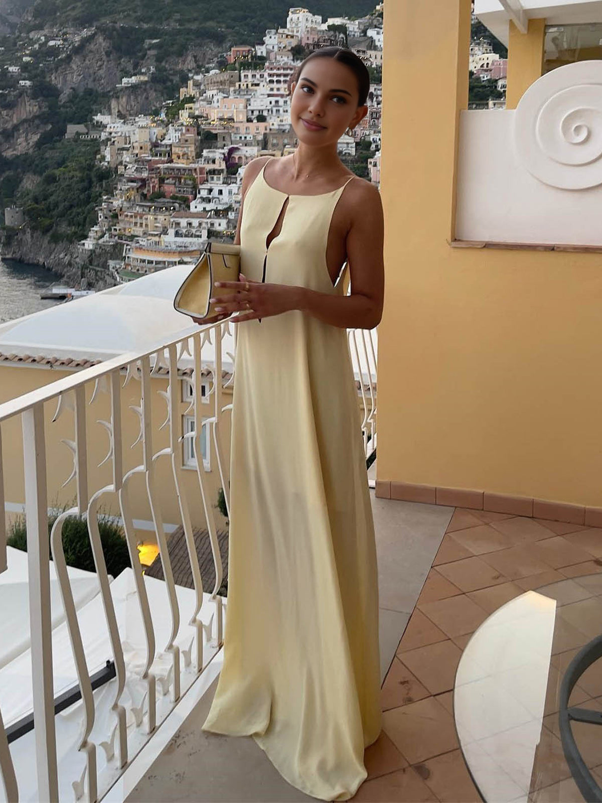 Women's light yellow satin slip maxi dress with fluid drape