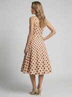 Women's beige vintage polka dot midi dress with fitted bodice