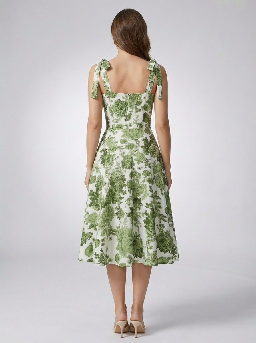 Women's green floral a-line dress with fitted bodice and flared skirt