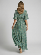 Women's floral maxi dress with deep v-neck and high side slit