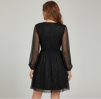 Women's black velvet cocktail dress with a-line silhouette