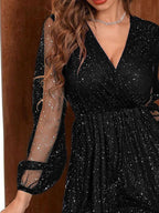 Women's black velvet cocktail dress with a-line silhouette